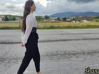 Cute teen with long hair and a high heels gets a wet and wild alfresco shower